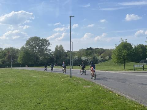 Five children cycling through Barrington