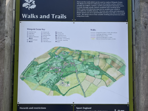 A photograph of the walks and trails information board at the Wimpole Estate.